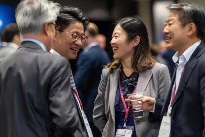 four business professionals stand group smiling laughing 14117 1058583 टूरिज्म एक्सपो जापान 2024 में बिजनेस ट्रैवल में उछाल, 148,062 लोग वैश्विक नेटवर्किंग और सांस्कृतिक कार्यक्रमों में शामिल होंगे